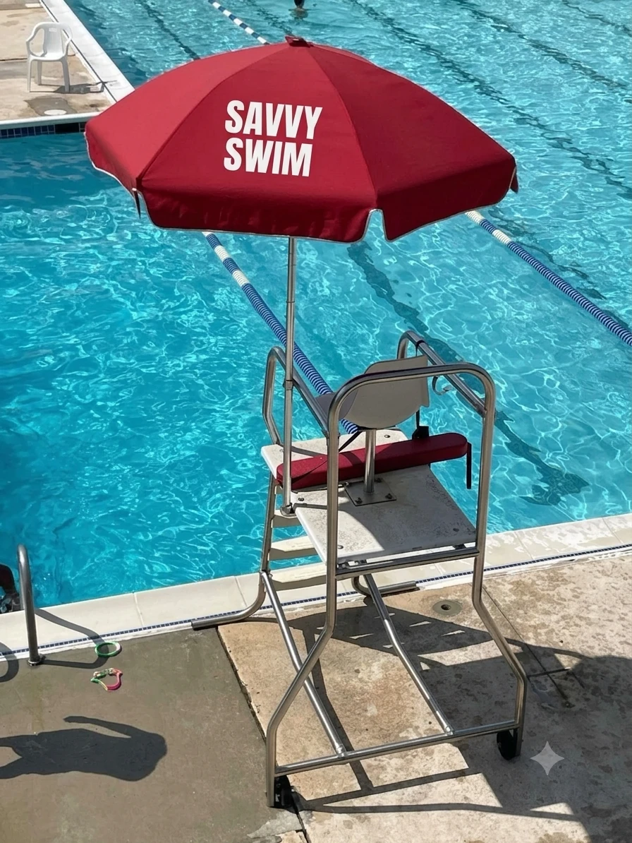 Savvy Swim umbrella and lifeguard chair beside a clean backyard pool